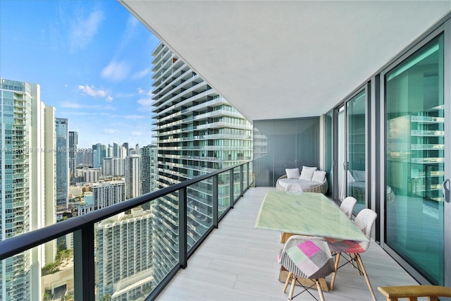 balcony featuring a view of city