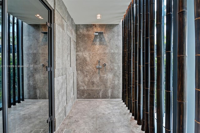 full bath with a shower stall