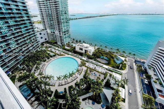 bird's eye view featuring a water view and a view of city