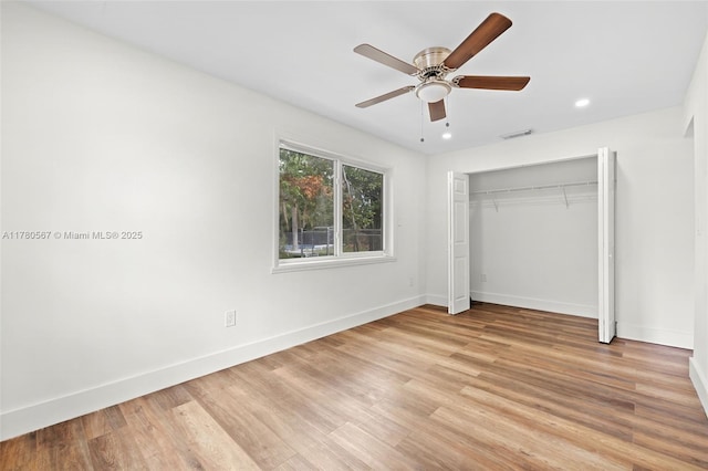 unfurnished bedroom featuring light wood-type flooring, baseboards, recessed lighting, a ceiling fan, and visible vents
