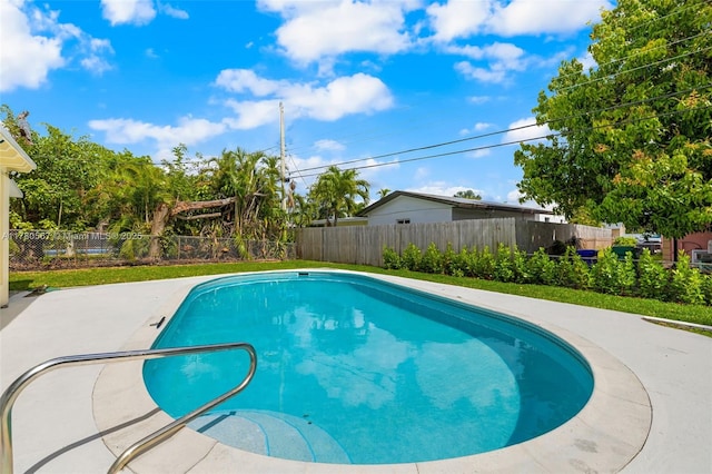 view of swimming pool with a fenced in pool, a patio area, and a fenced backyard