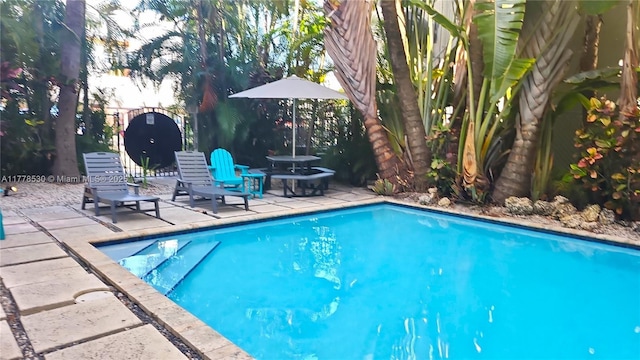 swimming pool with a patio