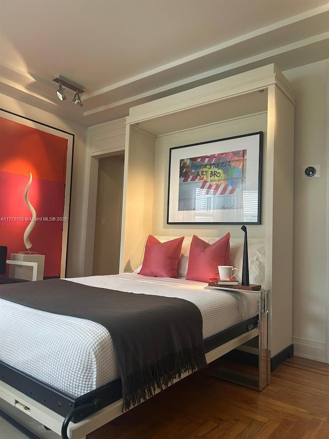 bedroom featuring baseboards