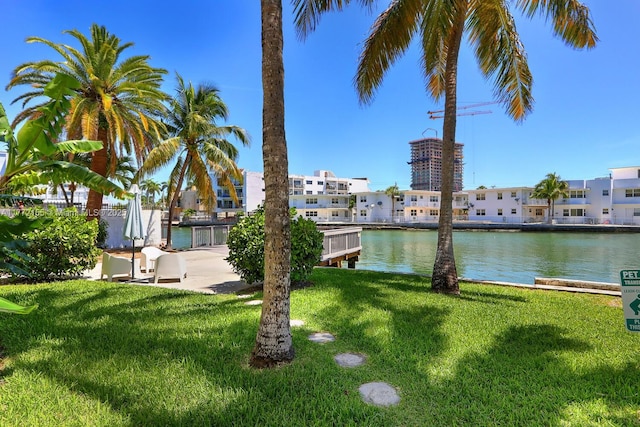 exterior space featuring a water view and a residential view