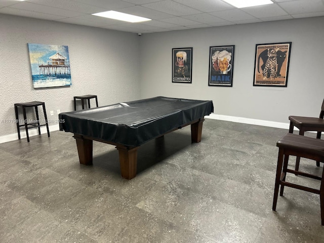 recreation room featuring billiards, baseboards, and a paneled ceiling
