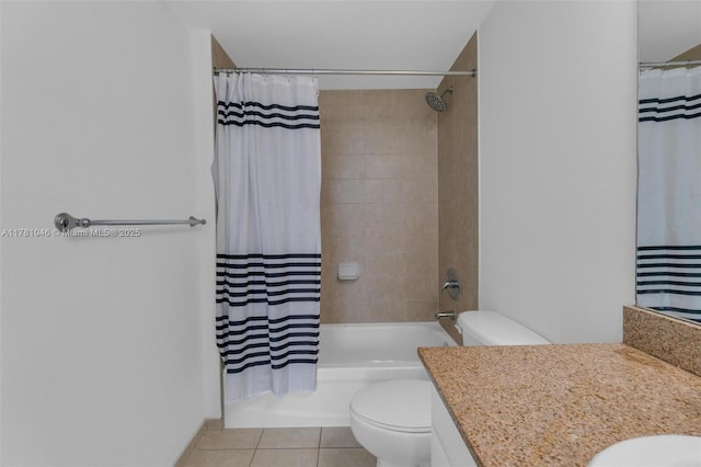 bathroom featuring shower / bath combo, toilet, vanity, and tile patterned floors