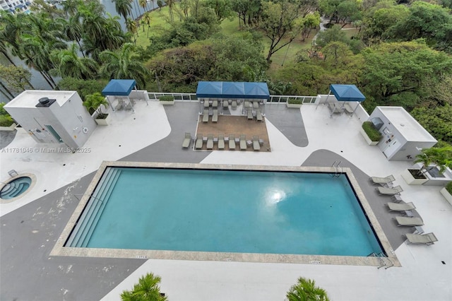 community pool featuring a patio area