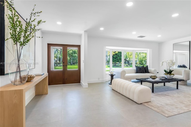 7551 SW 109th Ter, Pinecrest, FL 33156 - entrance foyer with french doors, recessed lighting, and healthy amount of natural light