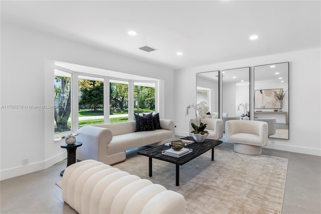 7551 SW 109th Ter, Pinecrest, FL 33156 - living area with finished concrete flooring and recessed lighting