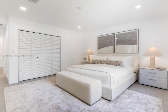 7551 SW 109th Ter, Pinecrest, FL 33156 - bedroom featuring a closet, light tile patterned flooring, and recessed lighting