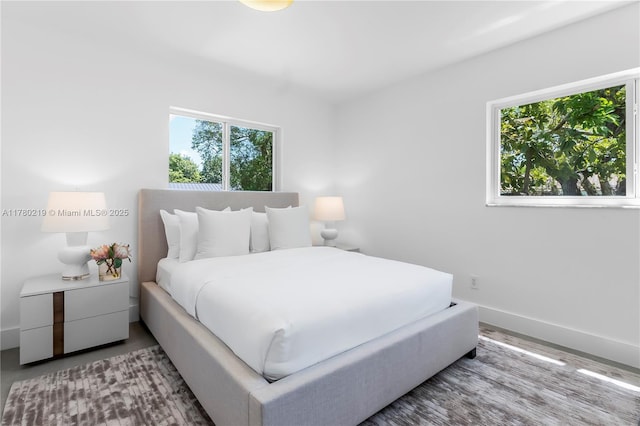 7551 SW 109th Ter, Pinecrest, FL 33156 - bedroom featuring baseboards and wood finished floors