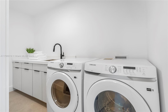 7551 SW 109th Ter, Pinecrest, FL 33156 - laundry area with washing machine and dryer and cabinet space