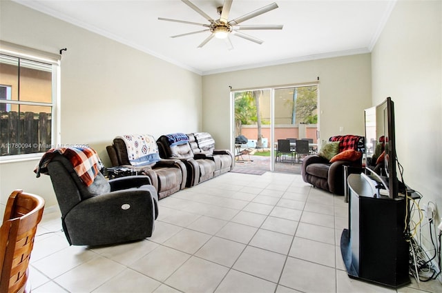 living area featuring crown molding, light tile patterned floors, and a ceiling fan