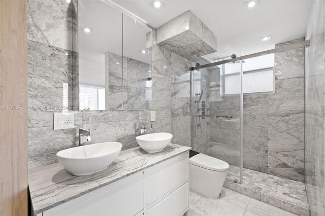 1658 Bay Rd Unit 504, Miami Beach, FL 33139 - full bath with toilet, tile walls, a sink, and a stall shower