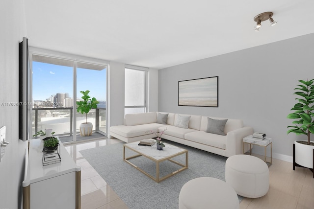 living area featuring floor to ceiling windows