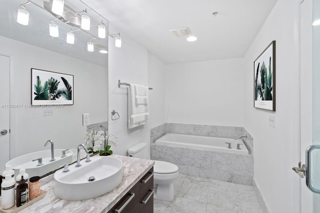 full bathroom with a garden tub, toilet, marble finish floor, and vanity