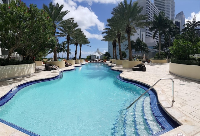 pool with a patio