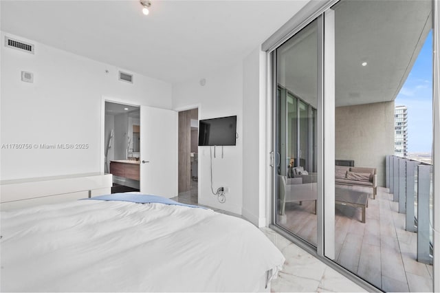 bedroom featuring visible vents, expansive windows, and marble finish floor