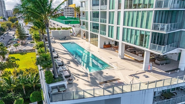 community pool with a patio