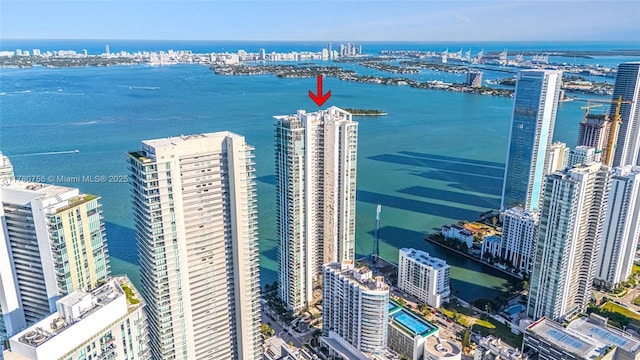 aerial view with a city view and a water view