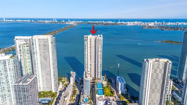 aerial view with a water view and a city view