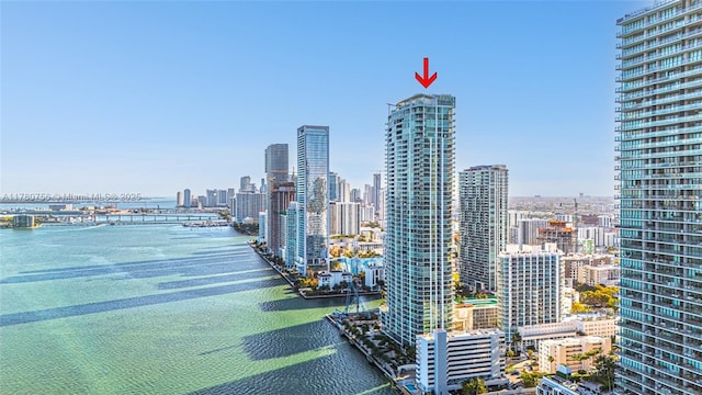 property's view of city featuring a water view