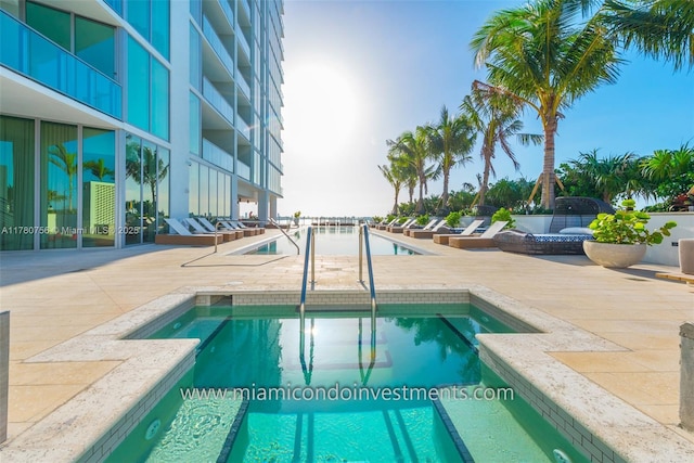 pool with a patio area