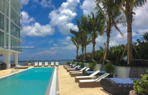 pool with a patio area