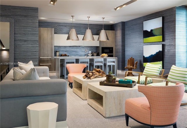 living area featuring light colored carpet