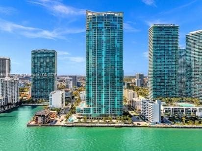 property's view of city with a water view