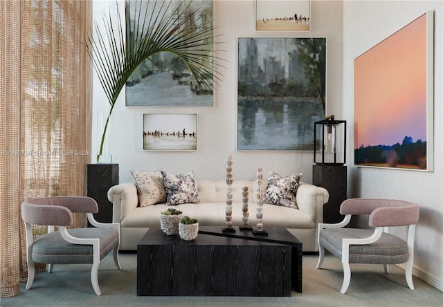 carpeted living room with baseboards and plenty of natural light