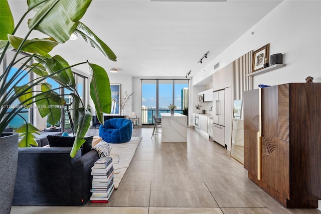 3470 E Coast Ave Unit H2601, Miami, FL 33137 - living area featuring rail lighting and floor to ceiling windows