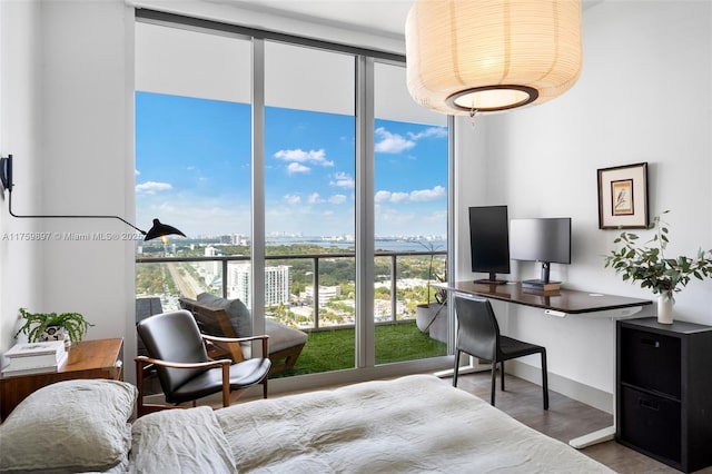 3470 E Coast Ave Unit H2601, Miami, FL 33137 - bedroom with expansive windows and wood finished floors