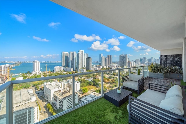 3470 E Coast Ave Unit H2601, Miami, FL 33137 - balcony with a skyline view, an outdoor hangout area, and a water view