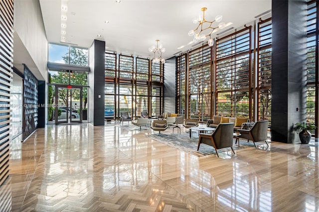 3470 E Coast Ave Unit H2601, Miami, FL 33137 - building lobby featuring a towering ceiling and floor to ceiling windows