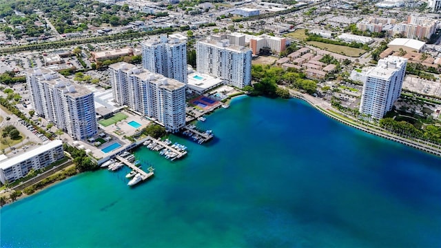 aerial view featuring a view of city and a water view