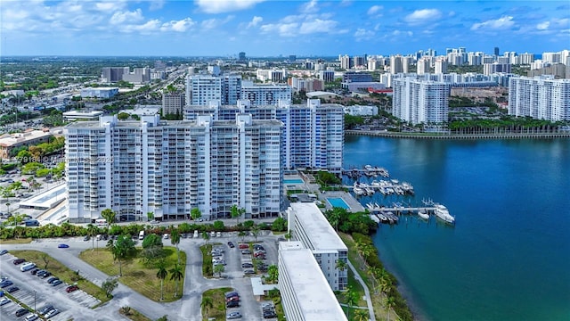 bird's eye view with a view of city and a water view