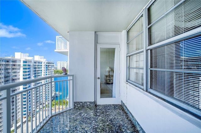 balcony featuring a city view