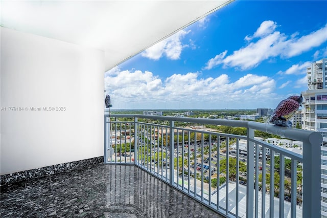 balcony featuring a city view