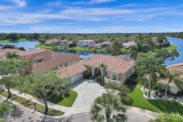 aerial view featuring a water view and a residential view