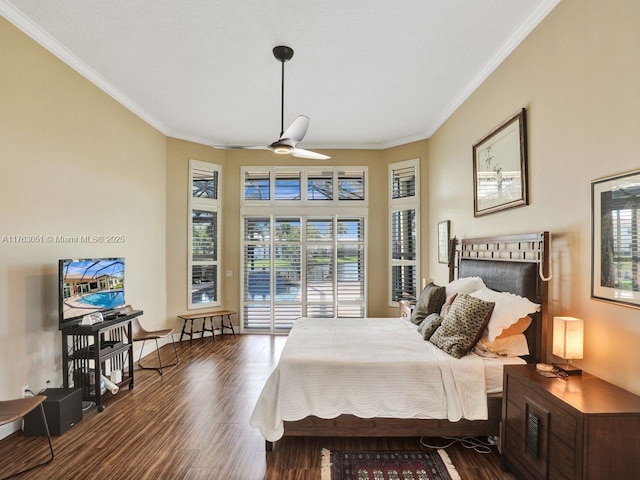 bedroom featuring access to exterior, ornamental molding, a ceiling fan, and wood finished floors