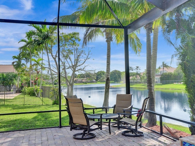 sunroom with a water view