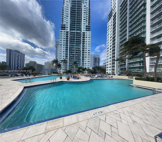 253 NE 2nd St Unit 1003, Miami, FL 33132 - community pool with a view of city and a patio