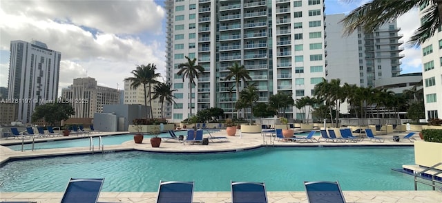 253 NE 2nd St Unit 1003, Miami, FL 33132 - community pool with a patio area and a city view