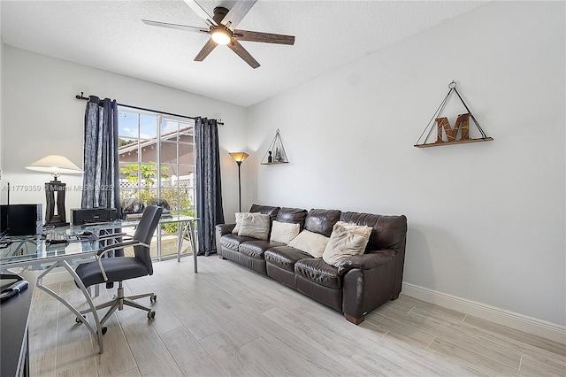 1008 NW 116th Ave, Coral Springs, FL 33071 - office area featuring wood finished floors, a ceiling fan, and a textured ceiling