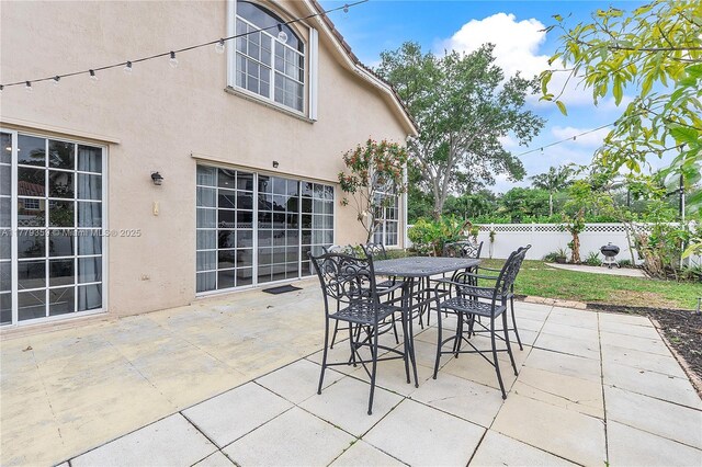 1008 NW 116th Ave, Coral Springs, FL 33071 - view of patio with outdoor dining space