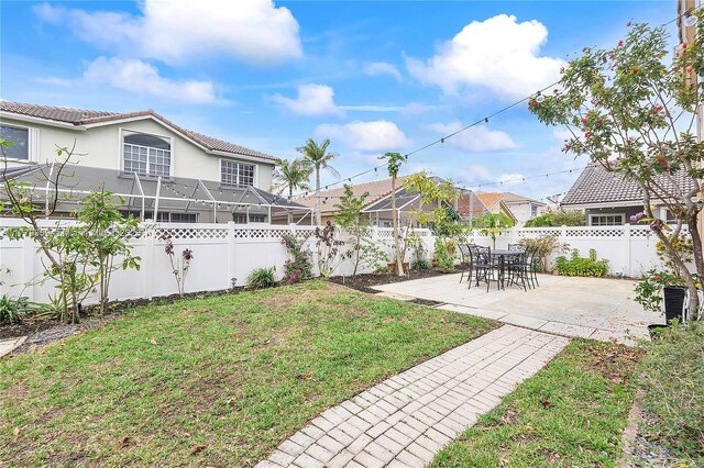 1008 NW 116th Ave, Coral Springs, FL 33071 - fenced backyard with a patio and a residential view