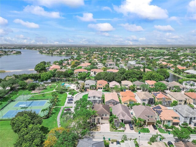 1008 NW 116th Ave, Coral Springs, FL 33071 - aerial view of property and surrounding area featuring a nearby body of water and nearby suburban area