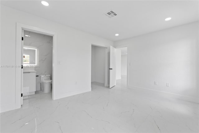 unfurnished bedroom featuring connected bathroom, visible vents, recessed lighting, marble finish floor, and baseboards