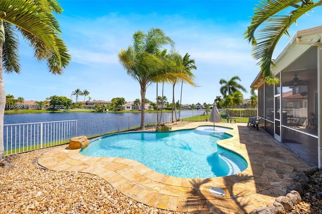 view of pool featuring a fenced backyard, a fenced in pool, a patio, and a sunroom